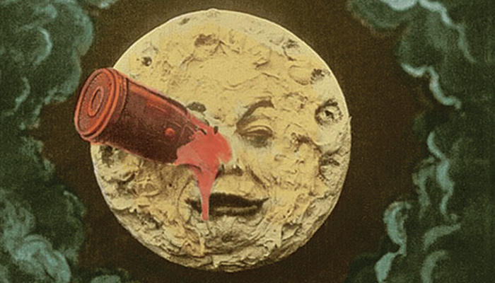 Color image of the man in the moon with a spaceship in his eye from the Georges Melies film A Trip to the Moon